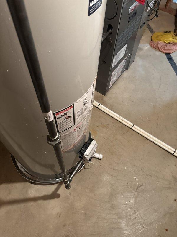 Completed installation of a 50-gallon residential tanked water heater in utility room. Removed existing unit, installed new water heater with proper copper piping connections, pressure relief valve, and shut-off valve. All connections were tested for leaks and unit was verified operational upon completion.