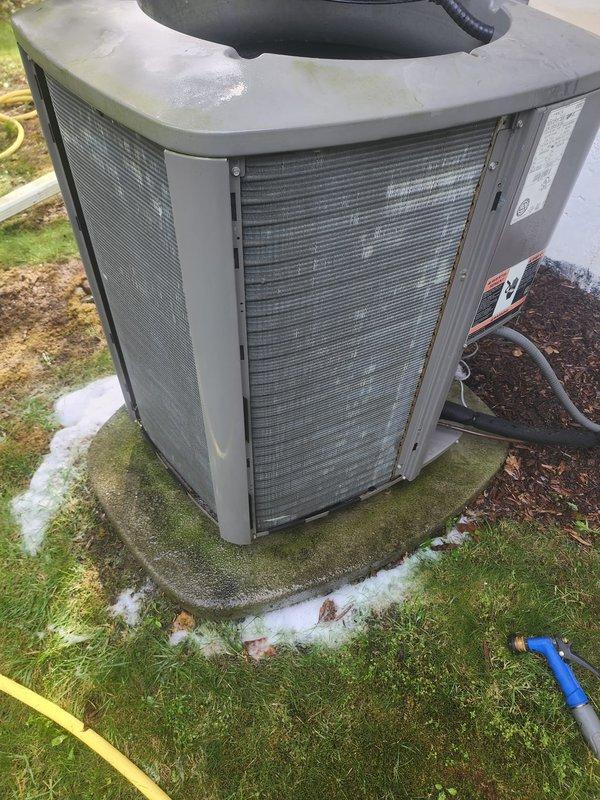 Completed comprehensive AC tune-up on approximately 15-year-old outdoor condensing unit. Performed system diagnostics using Fieldpiece SMAN manifold gauge, measuring refrigerant pressures and temperatures across the system to verify proper charge levels and operational parameters. Inspected condenser coils, fan operation, electrical connections, and refrigerant lines; noted unit operational with readings within acceptable range for ambient conditions.