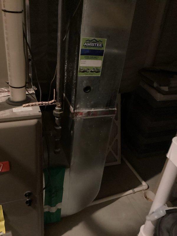 Performed comprehensive assessment of residential furnace system following heat exchanger failure diagnosis. Documented existing HVAC installation including furnace unit, metal ductwork configuration, PVC condensate drain and exhaust piping, and associated mechanical connections. Prepared detailed equipment replacement estimate for failed heat exchanger requiring furnace replacement due to safety concerns and system integrity. Photographed current installation setup showing proper drainage system, electrical conduit routing, and mechanical room layout to facilitate accurate equipment specification and installation planning.