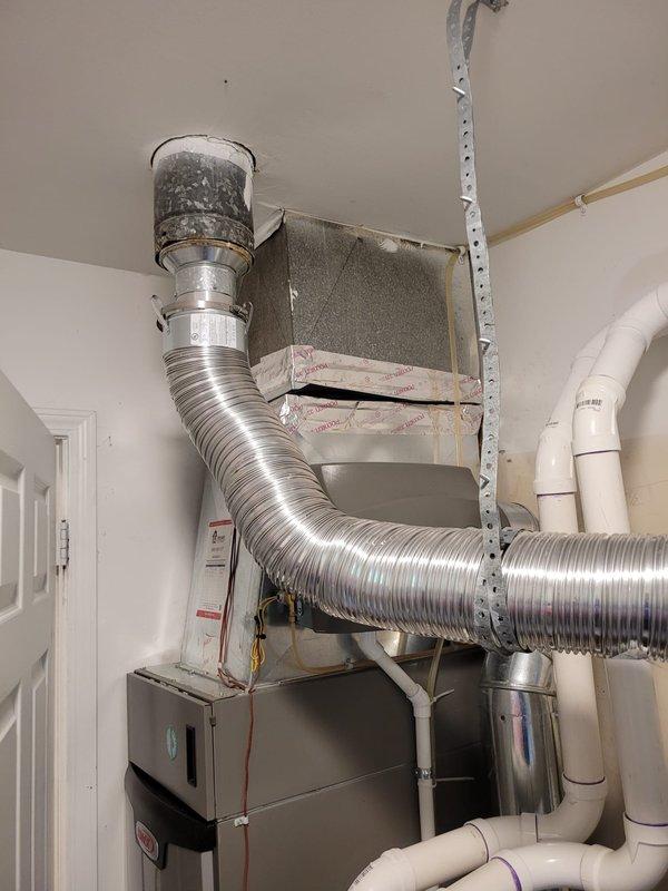 Installed a new Bradford White 40-gallon atmospheric vent natural gas water heater, model RG240T6N, with 40,000 BTU/hr input rating. The unit was positioned in a utility closet alongside existing HVAC equipment, with proper clearances maintained per manufacturer specifications and code requirements. All gas connections, water supply lines, temperature and pressure relief valve, and venting were completed to ensure safe and efficient operation of the new water heating system.