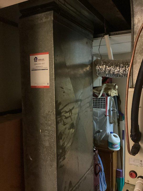 Completed furnace replacement estimate for a 40-year-old heating system with a rusted-out secondary heat exchanger. Documented existing equipment condition and confirmed replacement parts are no longer available due to system age, necessitating full unit replacement.