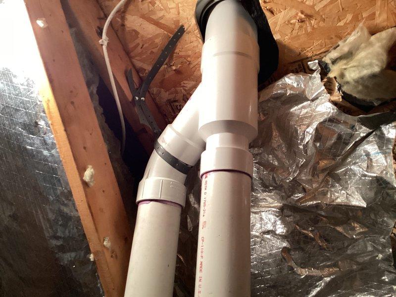 Responded to callback for roof leak associated with furnace vent pipe penetration. Installed proper flashing and weatherproofing around the white PVC vent pipe where it exits through the asphalt shingle roof. Applied roofing sealant at the base of the penetration to ensure water-tight seal and prevent future moisture intrusion. Verified vent pipe is properly secured in attic space with mounting brackets and confirmed adequate clearance from insulation materials.