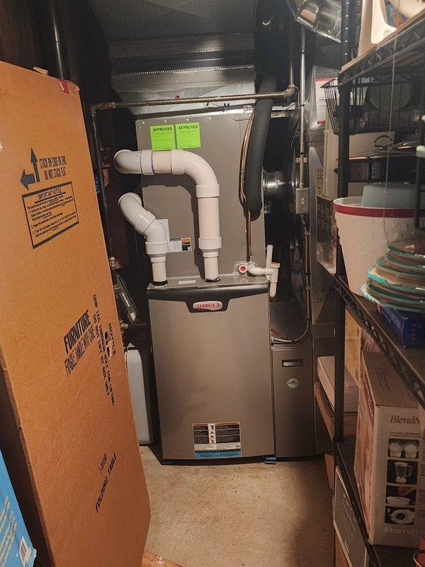 Completed routine preventative maintenance service under Worry Free Service Agreement for residential cooling system. Performed comprehensive inspection of Lennox furnace unit in basement utility area, verifying proper operation of all components, PVC condensate drainage configuration, and system controls. Conducted thorough maintenance on outdoor condenser unit including cleaning of coil surfaces, inspection of fan motor and grille assembly, verification of electrical connections and refrigerant lines, and confirmation of proper unit operation on concrete pad. All equipment found to be operating within normal parameters with no deficiencies noted.