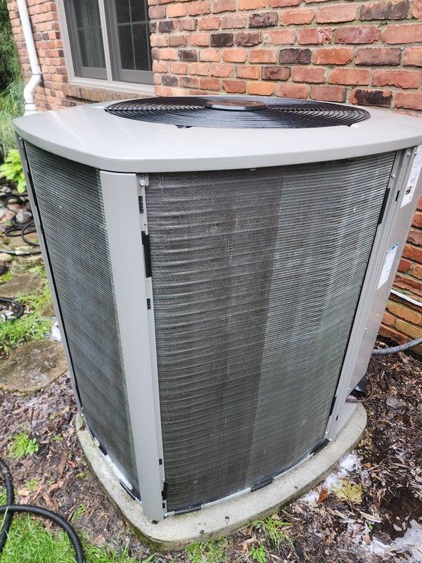 Completed routine preventative maintenance service under Worry Free Service Agreement for residential cooling system. Performed comprehensive inspection of Lennox furnace unit in basement utility area, verifying proper operation of all components, PVC condensate drainage configuration, and system controls. Conducted thorough maintenance on outdoor condenser unit including cleaning of coil surfaces, inspection of fan motor and grille assembly, verification of electrical connections and refrigerant lines, and confirmation of proper unit operation on concrete pad. All equipment found to be operating within normal parameters with no deficiencies noted.