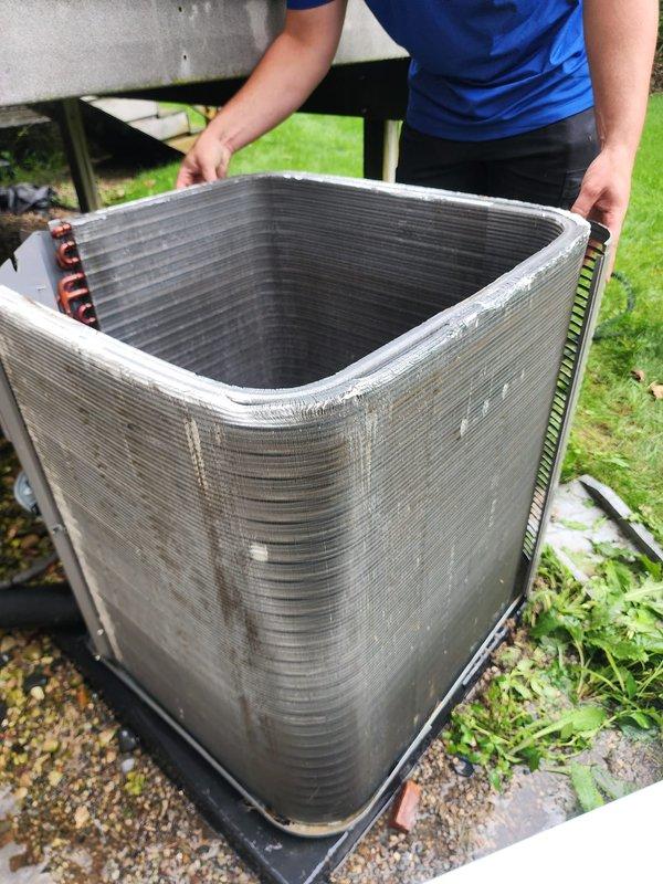 Completed comprehensive cooling season maintenance on a 4-year-old air conditioning system located in the basement as part of the Worry Free Service Agreement. Performed full system inspection of outdoor condenser unit, examining compressor operation, refrigerant lines, and condenser coil condition. Inspected electrical connections, wire harness integrity, and verified proper compressor mounting. Evaluated aluminum fin condition on heat exchanger coil and assessed overall system components for wear and functionality. System operating within normal parameters with no issues identified or repairs required at this time.