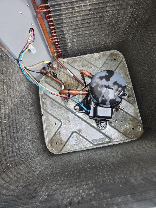 Completed comprehensive cooling season maintenance on a 4-year-old air conditioning system located in the basement as part of the Worry Free Service Agreement. Performed full system inspection of outdoor condenser unit, examining compressor operation, refrigerant lines, and condenser coil condition. Inspected electrical connections, wire harness integrity, and verified proper compressor mounting. Evaluated aluminum fin condition on heat exchanger coil and assessed overall system components for wear and functionality. System operating within normal parameters with no issues identified or repairs required at this time.