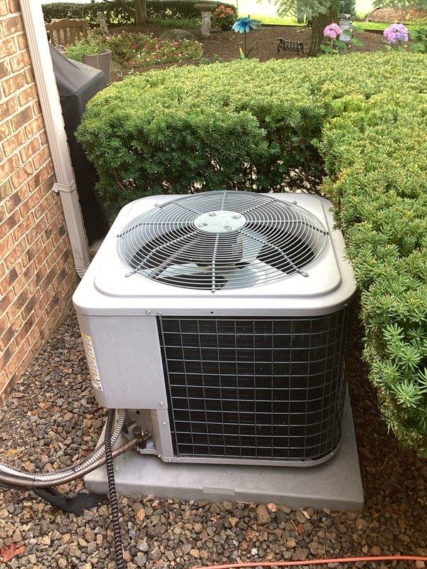 Completed comprehensive replacement estimate for residential HVAC system including outdoor condensing unit and indoor air handling equipment. Documented existing equipment configuration, measured installation area dimensions, assessed electrical service compatibility, and photographed current system setup to provide accurate replacement specifications and equipment recommendations.