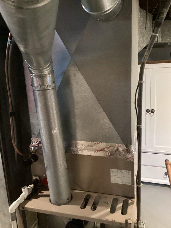 Conducted comprehensive free estimate for complete HVAC system replacement at residential property. Evaluated 30-year-old furnace unit located in basement utility area with vertical ductwork configuration and drain pan assembly, along with outdoor air conditioning condenser unit positioned on gravel bed against exterior brick wall. Both systems currently operational but at end of expected service life. Documented existing equipment specifications, ductwork connections, electrical service, and installation conditions through photographic assessment. Provided replacement recommendations and equipment options for both heating and cooling components to homeowner with all decision-makers present during morning consultation appointment.