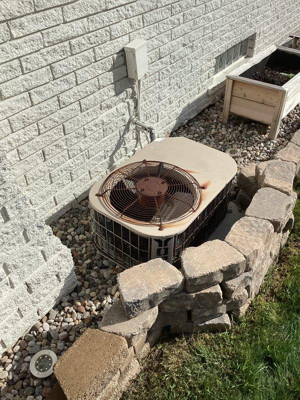 Conducted comprehensive free estimate for complete HVAC system replacement at residential property. Evaluated 30-year-old furnace unit located in basement utility area with vertical ductwork configuration and drain pan assembly, along with outdoor air conditioning condenser unit positioned on gravel bed against exterior brick wall. Both systems currently operational but at end of expected service life. Documented existing equipment specifications, ductwork connections, electrical service, and installation conditions through photographic assessment. Provided replacement recommendations and equipment options for both heating and cooling components to homeowner with all decision-makers present during morning consultation appointment.