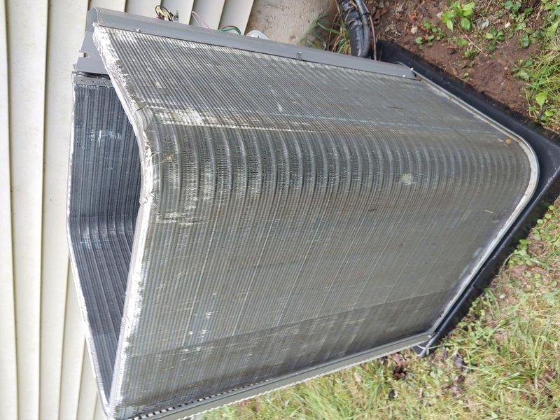 Completed scheduled preventive maintenance on residential air conditioning system under Worry Free Service Agreement. Performed comprehensive inspection of indoor evaporator coil and outdoor condenser unit, documenting system condition with photographic evidence. Outdoor condenser unit showed moderate accumulation of dirt and debris in fin surfaces, which was addressed as part of routine maintenance protocol to ensure optimal heat transfer efficiency and system performance.