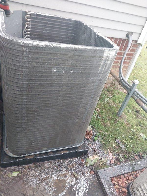 Completed routine AC maintenance inspection on outdoor condensing unit. Performed visual assessment of compressor, condenser coils, refrigerant lines, and electrical connections. Unit operational with normal wear consistent with outdoor exposure. Condenser fins showed accumulation of dirt and debris. Documented equipment condition through photographic records for maintenance history. All major components functioning within normal parameters at time of inspection.