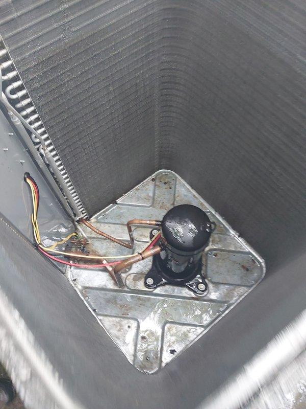 Completed routine AC maintenance inspection on outdoor condensing unit. Performed visual assessment of compressor, condenser coils, refrigerant lines, and electrical connections. Unit operational with normal wear consistent with outdoor exposure. Condenser fins showed accumulation of dirt and debris. Documented equipment condition through photographic records for maintenance history. All major components functioning within normal parameters at time of inspection.