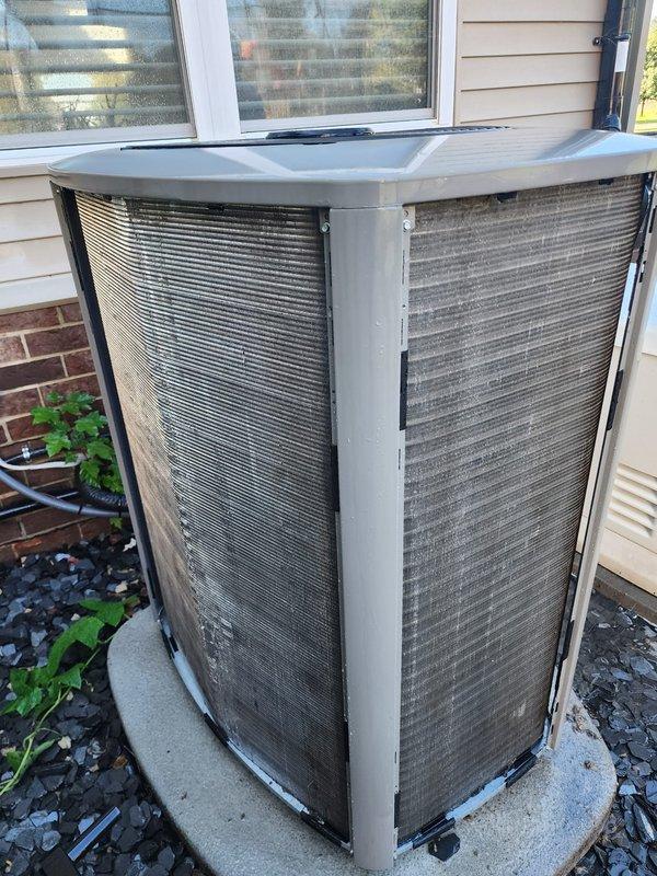 Completed routine preventative maintenance on residential outdoor air conditioning condenser unit. Performed comprehensive tune-up including inspection of compressor, refrigerant lines, and electrical connections. Verified proper operation of all system components, examined condenser coils and protective grilles for adequate airflow, and confirmed unit stability on concrete pad. System operating within normal parameters with no issues identified during inspection.