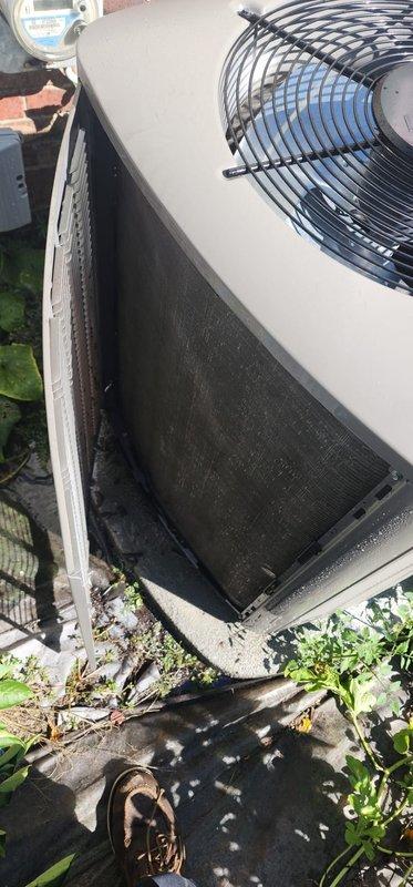 Completed preventive maintenance inspection on residential air conditioning system per Worry Free Service Agreement protocol. Performed visual inspection of outdoor condensing unit, noting accumulated debris and dust on coil surfaces and concrete pad, and examined indoor components including electrical connections and refrigerant lines. Unit operational at time of service with no immediate deficiencies requiring corrective action.