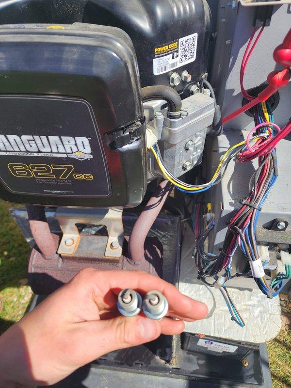 Completed scheduled Generator Maintenance 3-5 service on outdoor standby generator unit equipped with Vanguard 627cc engine. Performed comprehensive inspection of electrical components, removed and replaced failed capacitors from the control system, and verified all wire connections within the electrical panel. Addressed significant corrosion on exhaust muffler assembly and confirmed proper engine mounting and battery connections before restoring unit to operational status.
