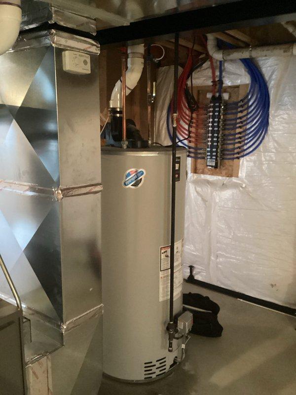 Performed water heater estimate for a 13-year-old tank actively leaking from the bottom. Documented existing installation in basement mechanical room, including current plumbing connections with copper piping and PEX tubing, and provided replacement recommendations requiring scheduled appointment for installation.