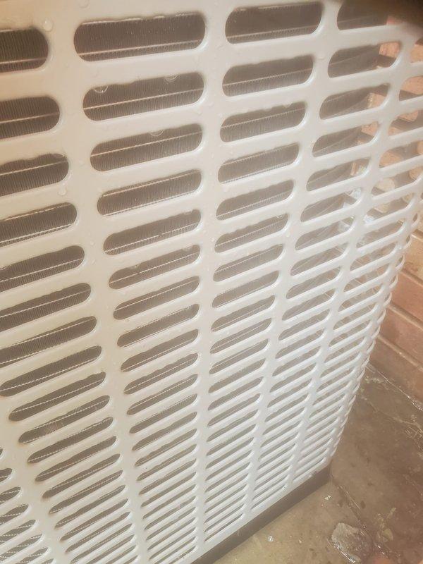 Completed routine AC tune-up and preventive maintenance under prepaid service plan. Performed comprehensive system inspection of outdoor condensing unit, including examination of condenser coils, fan motor operation, and protective housing. Verified proper airflow through louvered grille panels and checked internal components for normal operation. System tested and confirmed operating within normal parameters with no deficiencies noted.