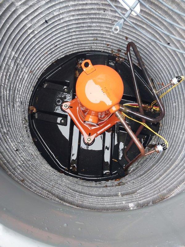 Completed comprehensive AC tune-up and preventive maintenance on 12-year-old air conditioning system. Performed thorough inspection of outdoor condenser unit and indoor evaporator coil assembly, including examination of refrigerant lines, float switch mechanism, and heat exchanger fins. All components found operating within normal parameters with no deficiencies noted; system performing as expected for unit age.