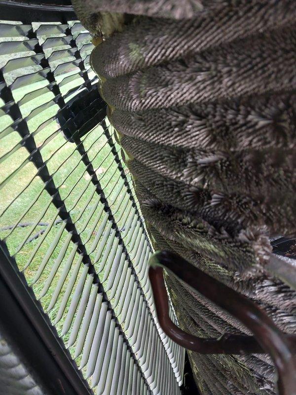 Completed comprehensive AC tune-up and preventive maintenance on 12-year-old air conditioning system. Performed thorough inspection of outdoor condenser unit and indoor evaporator coil assembly, including examination of refrigerant lines, float switch mechanism, and heat exchanger fins. All components found operating within normal parameters with no deficiencies noted; system performing as expected for unit age.