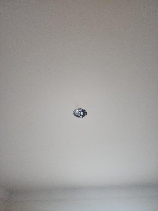 Installed and secured a new ceiling-mounted electrical fixture with pull chain operation in an interior room. Completed all necessary wiring connections at the junction box and verified proper electrical function upon installation.