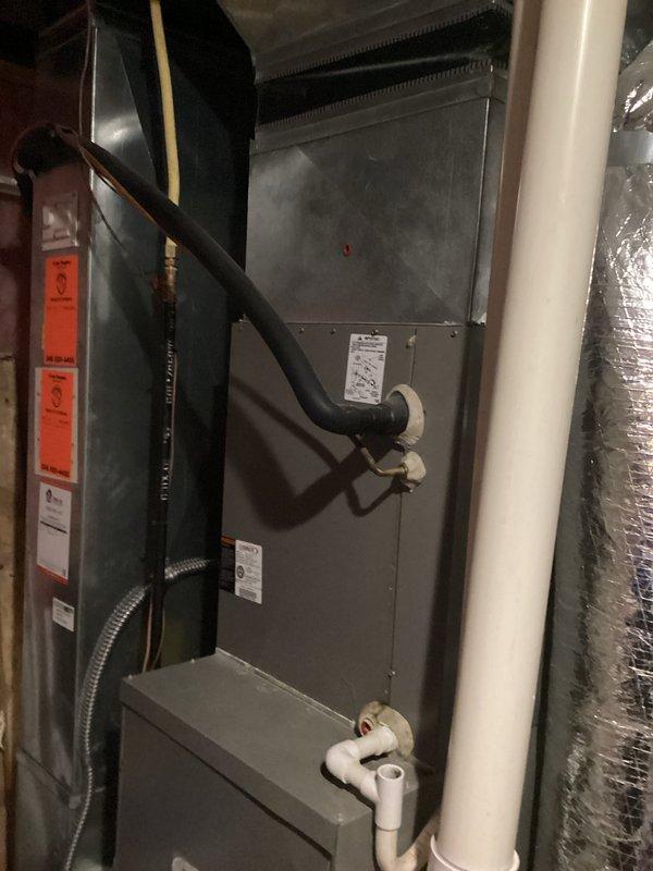 Provided comprehensive estimate for complete HVAC system replacement including 19-year-old furnace and air handler unit currently located in basement/attic space. Existing natural gas furnace and air handler remain operational but have reached end of expected service life. Assessment included evaluation of current ductwork, electrical connections, condensate drainage system, and venting requirements to ensure proper sizing and compatibility for new equipment installation.