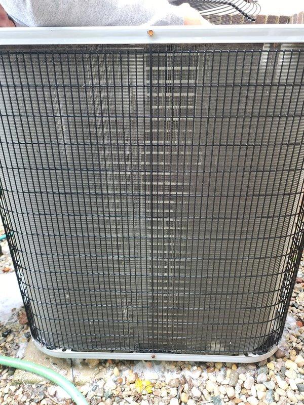 Completed routine cooling season maintenance on residential air conditioning system. Performed visual inspection of outdoor condenser unit, confirming compressor, copper refrigerant lines, and heat exchanger coils in proper working condition with fins clean and unobstructed for optimal airflow and heat transfer efficiency.