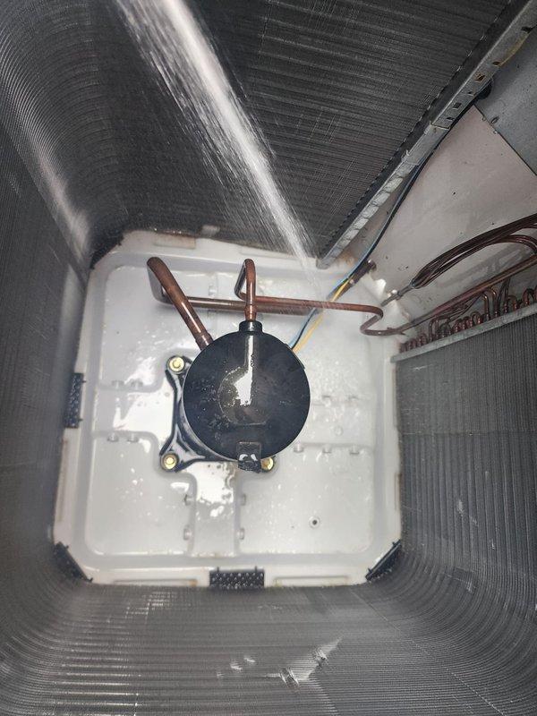 Completed routine cooling season maintenance on residential air conditioning system. Performed visual inspection of outdoor condenser unit, confirming compressor, copper refrigerant lines, and heat exchanger coils in proper working condition with fins clean and unobstructed for optimal airflow and heat transfer efficiency.