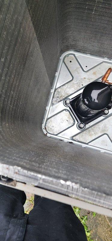 Completed routine AC maintenance inspection under Worry Free Service Agreement. Inspected and photographed evaporator coil assembly showing clean heat exchanger fins and tubing in good operating condition. Accessed blower compartment to inspect blower motor, housing, and refrigerant lines, confirming all components are functioning properly with normal dust accumulation for seasonal operation.