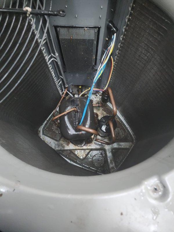 Completed routine preventive maintenance on residential split system air conditioning unit. Inspected outdoor condenser unit, confirmed proper positioning and clearances, and examined evaporator coil assembly with refrigerant lines and condensate drain pan. All components operating within normal parameters with no immediate service needs identified.