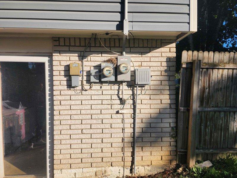 Performed site evaluation for installation of exterior 3-prong outlet to accommodate portable generator connection. Inspected existing electrical panel and exterior utility area to assess circuit availability and determine optimal routing for new outdoor receptacle. Documented current electrical service configuration including main panel with dual breaker rows and exterior meter bank setup. Provided complimentary estimate for installation of weather-resistant GFCI-protected outlet with appropriate amperage rating for generator use, including necessary conduit run from panel to exterior mounting location.