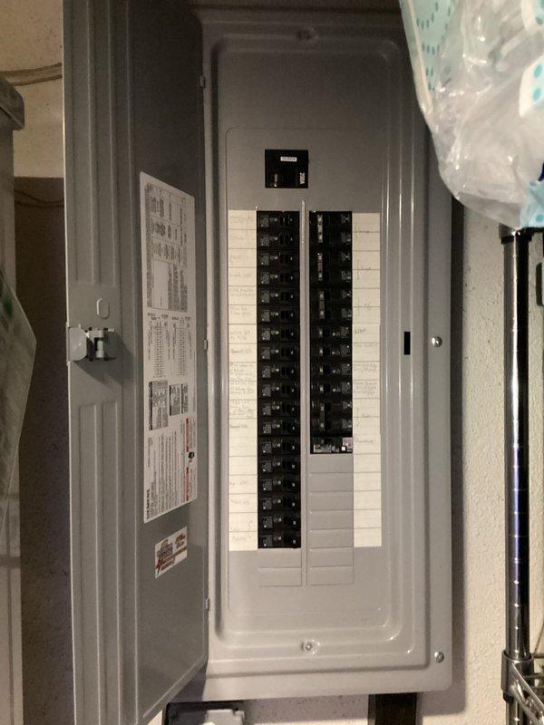 Conducted comprehensive HVAC system evaluation for aging equipment replacement estimate. Assessed existing air handler unit in basement installation, noting equipment age, overall condition, and operational status. Documented current system configuration including ductwork connections, condensate drain line assembly with PVC piping, and electrical service panel specifications to determine replacement requirements and compatibility for new equipment installation.