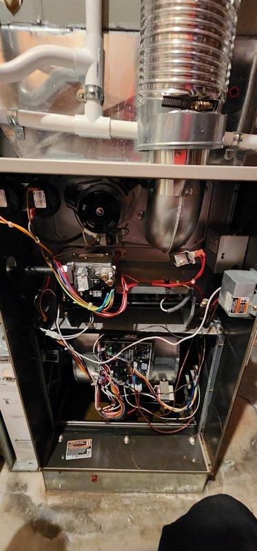 Completed scheduled heating maintenance tune-up on Bryant furnace system. Performed comprehensive inspection of all internal components including blower motor assembly, electrical connections, control boards, and wiring harnesses. System found operating properly with all components functioning within normal parameters; no repairs required at this time.