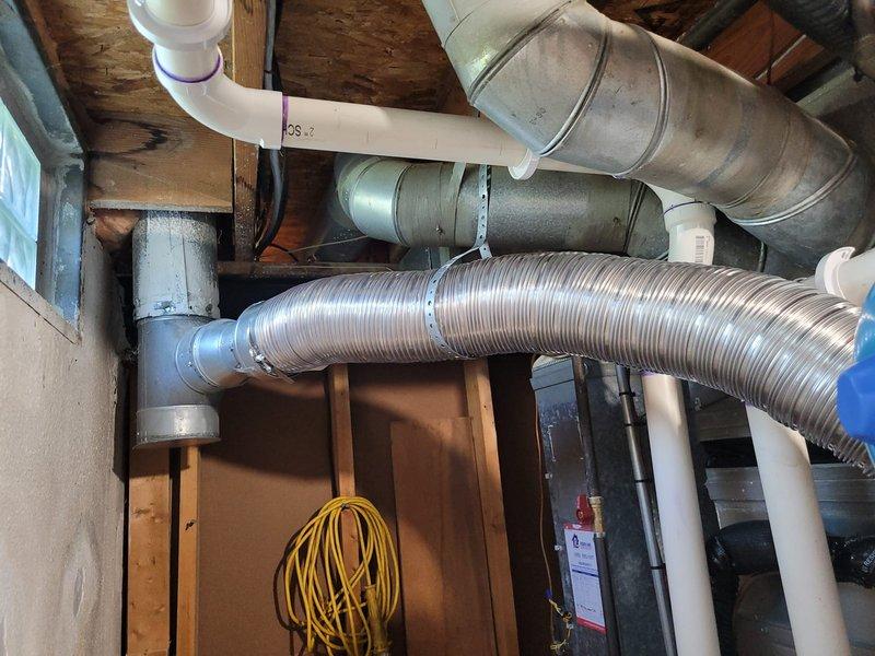 Successfully installed a new 40-gallon tanked water heater in the basement utility area. The installation included connecting copper supply piping to the unit, mounting a blue expansion tank above the water heater, and ensuring all plumbing connections were properly secured and tested for leaks. All work was completed to code specifications with the unit operational and ready for use.