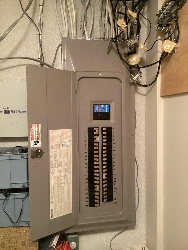 Conducted on-site evaluation for standby generator installation at residential property. Assessed existing electrical infrastructure including main service panel with dual breaker rows and external gas meter location for fuel supply connection. Documented current electrical capacity, available conduit pathways, and optimal placement considerations for automatic transfer switch integration. Provided comprehensive cost estimate ranging from $10,000-$12,000 based on generator sizing requirements, transfer switch specifications, gas line extension needs, and necessary electrical upgrades to accommodate emergency power system.