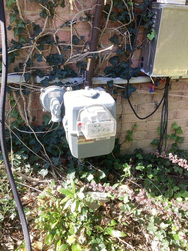 Conducted on-site evaluation for standby generator installation at residential property. Assessed existing electrical infrastructure including main service panel with dual breaker rows and external gas meter location for fuel supply connection. Documented current electrical capacity, available conduit pathways, and optimal placement considerations for automatic transfer switch integration. Provided comprehensive cost estimate ranging from $10,000-$12,000 based on generator sizing requirements, transfer switch specifications, gas line extension needs, and necessary electrical upgrades to accommodate emergency power system.
