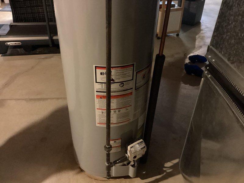 Installed shielded thermostat wire from indoor air handler to new thermostat location and outdoor unit, ensuring proper grounding of wire shielding to C terminal at furnace per manufacturer specifications. Replaced existing thermostat with new S40 model and verified proper system communication and operation upon completion.