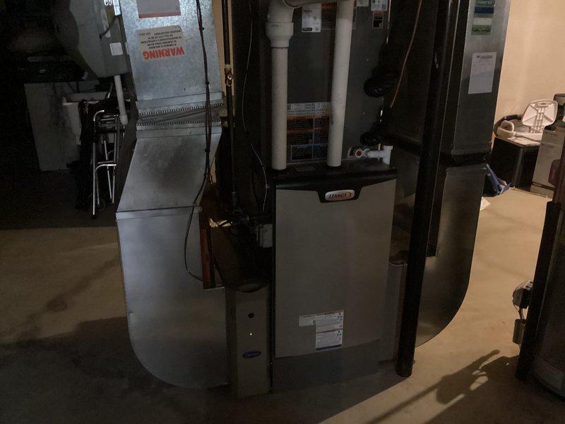 Installed shielded thermostat wire from indoor air handler to new thermostat location and outdoor unit, ensuring proper grounding of wire shielding to C terminal at furnace per manufacturer specifications. Replaced existing thermostat with new S40 model and verified proper system communication and operation upon completion.