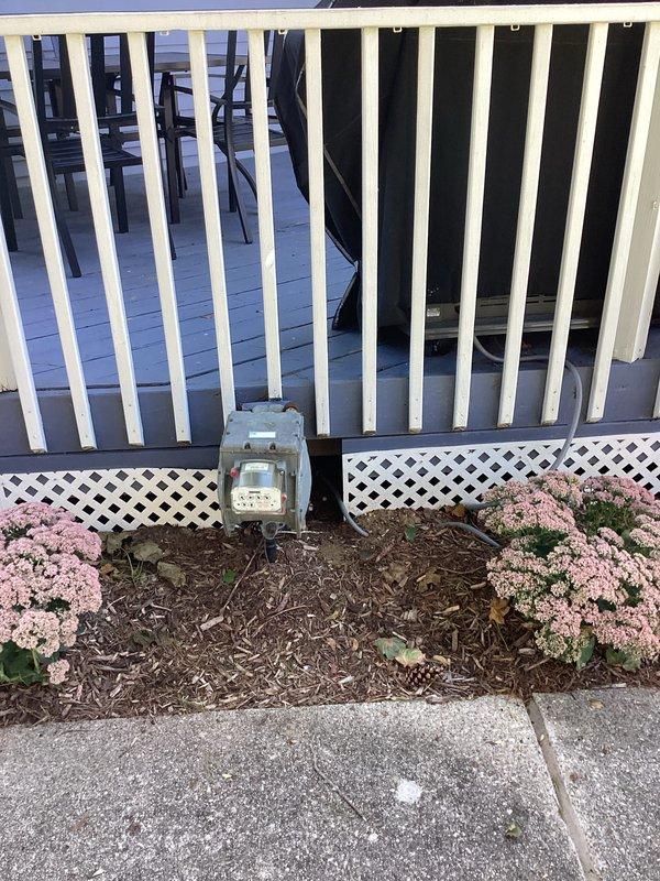 Conducted comprehensive site evaluation for standby generator installation at residential property. Assessed existing electrical service configuration, including meter location, available mounting space, and proximity to HVAC equipment. Documented current utility meter placement on exterior wall with existing conduit runs and evaluated secondary potential installation location near deck foundation with ground-level access. Customer provided with preliminary pricing estimates for generator system installation based on site conditions and electrical infrastructure requirements.