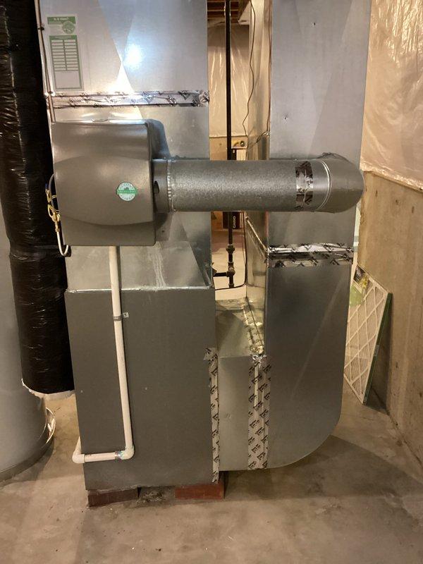 Serviced and repaired the whole-home humidifier unit mounted on the furnace system. Inspected the humidifier assembly, addressed operational issues, and verified proper water supply connections and drainage through the PVC piping system. Unit tested and confirmed to be functioning correctly with adequate humidity output.