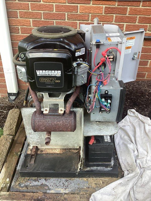 Completed scheduled maintenance on outdoor Vanguard 627cc backup generator system. Performed comprehensive inspection of electrical control panels, connections, and engine components. Replaced worn capacitors in the electrical control assembly, reconnected terminal blocks, and verified all wire connections were secure. Cleaned debris from equipment pad, inspected battery condition, and confirmed proper operation of all system components.