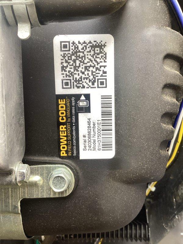 Performed scheduled maintenance on residential standby generator system. Removed and inspected spark plugs, finding normal wear consistent with operating hours. Verified all safety labels and warning placards intact and legible on unit housing. Inspected control panel display for proper function, confirming digital readout operational and system parameters within normal range. Examined electrical connections and wiring for signs of wear or damage, finding all connections secure. Documented equipment serial number and model information for service records. Unit tested and returned to operational status with all systems functioning as designed.