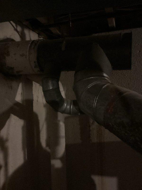 Provided comprehensive estimate for furnace replacement system in basement mechanical room. Current natural gas furnace from 1984 is operational but nearing end of service life. Assessed existing ductwork configuration, venting system with PVC exhaust, and available space constraints for new equipment installation.