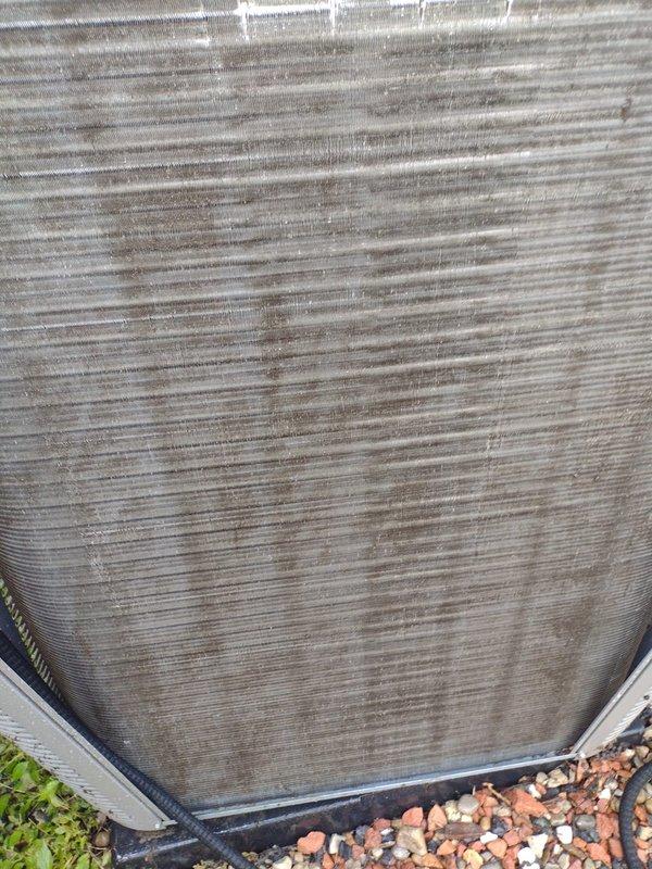 Completed comprehensive heating system maintenance inspection under Worry Free Service Agreement. Performed thorough examination of furnace interior components including blower motor, electrical connections, and wiring harnesses, confirming all systems operational with no deficiencies noted. Documented exterior condenser coil condition showing accumulated debris and recommended cleaning for optimal efficiency.