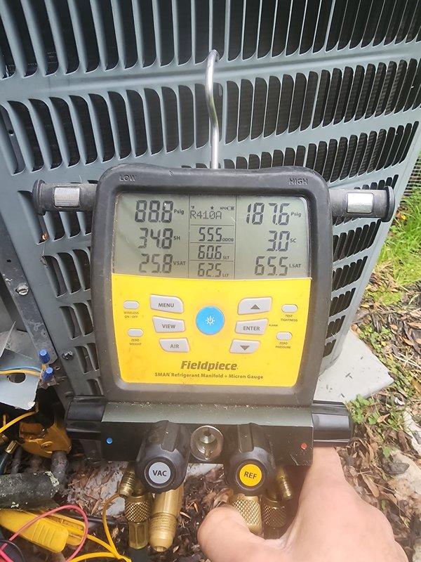 Completed comprehensive AC tune-up and preventative maintenance on residential split system as part of prepaid Worry Free Service plan. Performed refrigerant pressure and temperature diagnostics using manifold gauges, confirming R410A system operating within manufacturer specifications across all zones. Inspected furnace blower assembly and evaporator coil in basement air handler, verifying proper mechanical operation and airflow components.