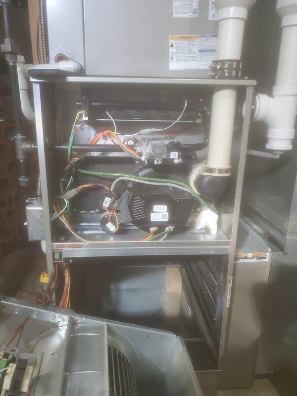 Completed preventative maintenance service on Bryant HVAC system including furnace and air conditioning components. Replaced UV bulb in air handler to maintain indoor air quality and microbial control. Installed new air filter to ensure proper airflow and system efficiency. Inspected gas valve assembly, blower motor, control module, and electrical connections throughout the system. Verified proper operation of condensate drain lines and PVC vent piping. All components tested and confirmed functioning within manufacturer specifications upon completion.