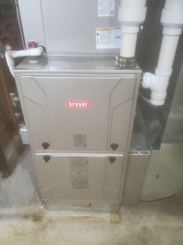Completed preventative maintenance service on Bryant HVAC system including furnace and air conditioning components. Replaced UV bulb in air handler to maintain indoor air quality and microbial control. Installed new air filter to ensure proper airflow and system efficiency. Inspected gas valve assembly, blower motor, control module, and electrical connections throughout the system. Verified proper operation of condensate drain lines and PVC vent piping. All components tested and confirmed functioning within manufacturer specifications upon completion.