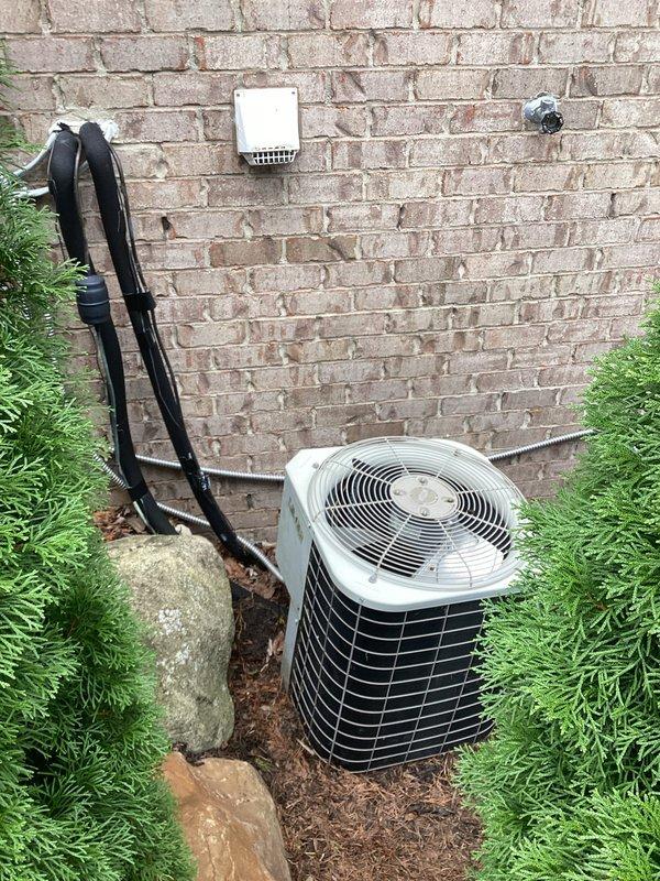 Provided comprehensive estimate for replacement of existing Bryant 3.5 ton air conditioning system after compressor failure rendered unit inoperable. Assessed outdoor condensing unit positioned against brick wall exterior, evaluated refrigerant line routing and electrical connections, and documented current system configuration including mounting location and landscape considerations. Presented replacement options for new 3.5 ton AC system to restore cooling capacity to residence.