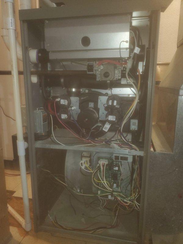 Completed comprehensive furnace maintenance inspection per prepaid maintenance agreement. Performed thorough system evaluation including inspection of heat exchanger assembly, blower motor operation, gas valve connections, electrical control boards, and all associated wiring throughout the unit. Verified proper operation of all mechanical and electrical components, checked burner assembly and combustion chamber, and confirmed venting system integrity. All components found operating within manufacturer specifications with no immediate safety concerns or repair needs identified at this time.