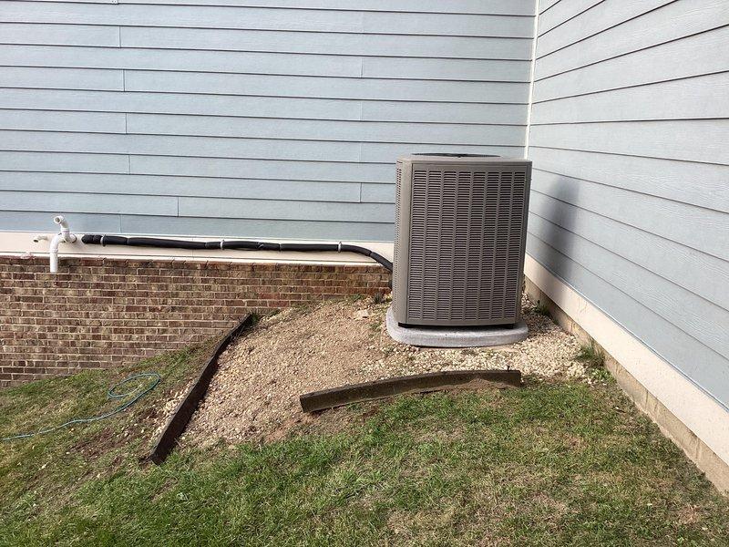 Completed full HVAC system replacement including outdoor condensing unit and indoor air handler with associated ductwork and condensate drainage system. Additionally installed new hot water heater in utility closet with proper venting and connections. All equipment positioned on gravel pad, electrical connections verified, refrigerant lines installed, and system tested for proper operation before customer acceptance.