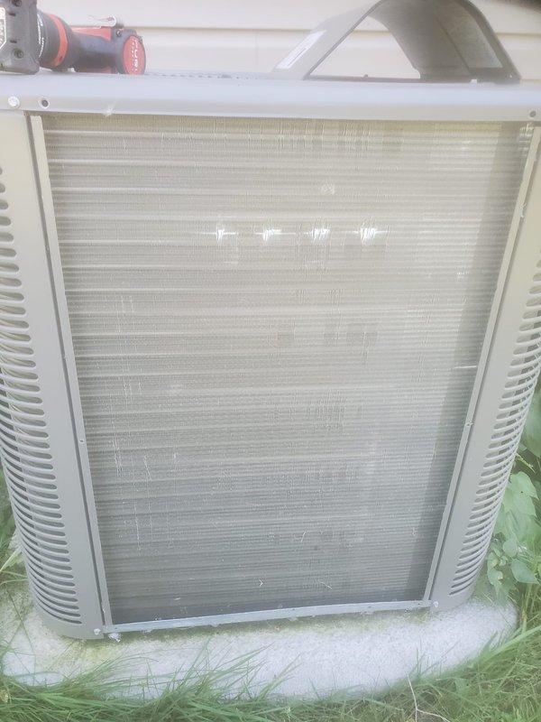 Completed comprehensive cooling system maintenance under Worry Free Service Agreement. Performed visual inspection of outdoor condensing unit, evaluated compressor operation, checked refrigerant connections and electrical wiring integrity, and assessed heat exchanger coil condition. Unit found operational with normal dust accumulation on condenser coils consistent with outdoor exposure.